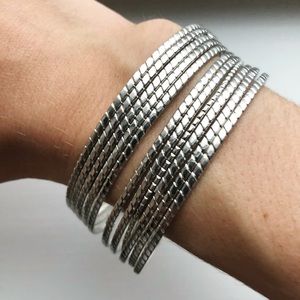 Set of 11 vintage silver segment bangle bracelets